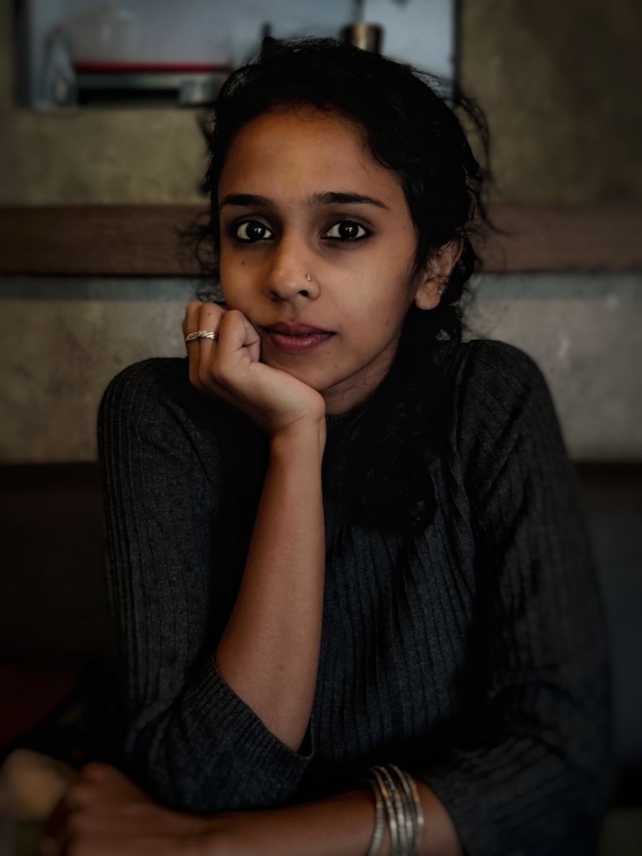 Portrait photo of Arya Rothe headshot.