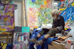 Kendal Hanna contemplates his work in his studio