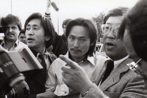 Black and white photo of Chol Soo Lee being taken into police custody.