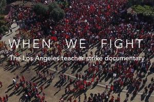teachers crowd a park wearing red on strike for better conditions.